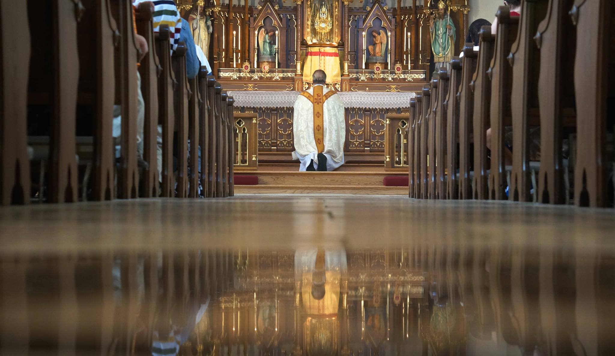 kneeling at the tabernacle